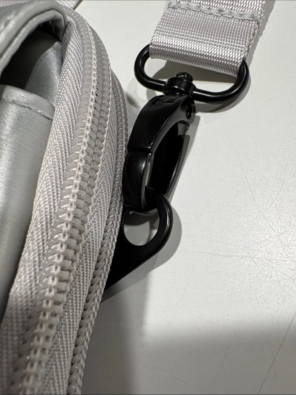 Ikwhip Metallic Matte Silver Everyday Crossbody Bag. Lots of pockets! Web strap